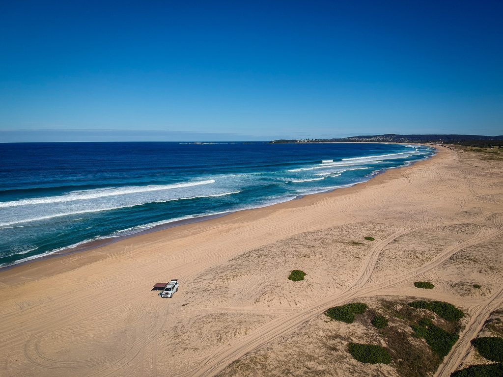 Blacksmiths Beach from the air