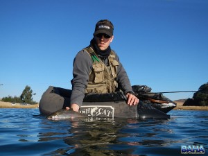 Warren releasing a fish