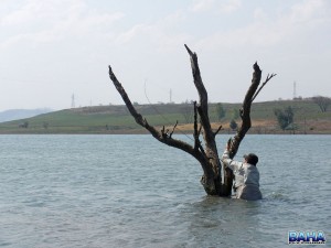 Nick retrieving precious bass poppers