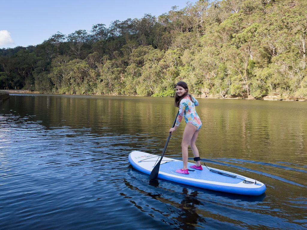 Emma enjoying her new SUP at Bobbin Head