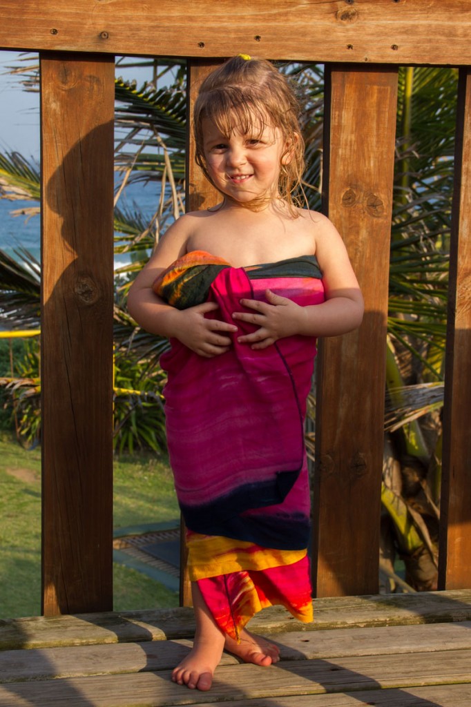 Emma relaxing on the deck in mom's sarong