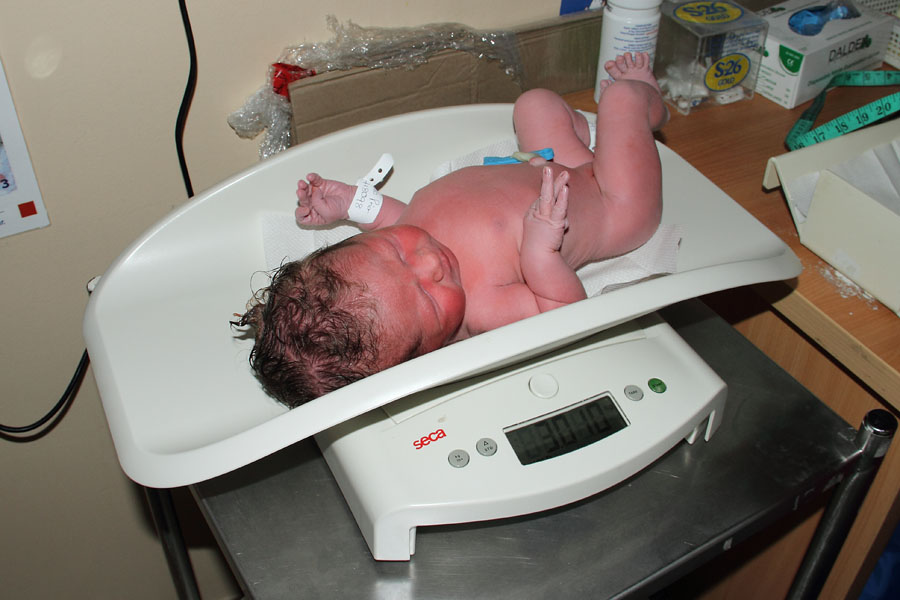 Emma Prior being weighed after birth
