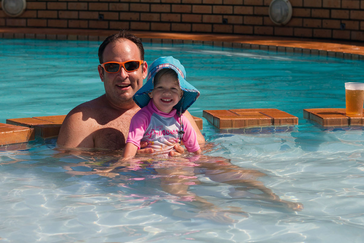Nick and Mila in the pool at Rocky Bay