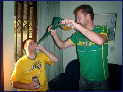Graham Taking A Vuvuzela Funnel From Wayne