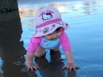 Emma exploring the beach