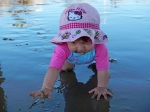 Emma exploring the beach