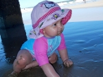 Emma exploring the beach