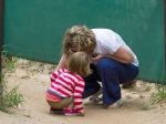 Emma and Sharon inspecting some insects